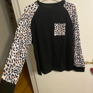 3X fits more like XL or 1X black leopard lightweight shirt